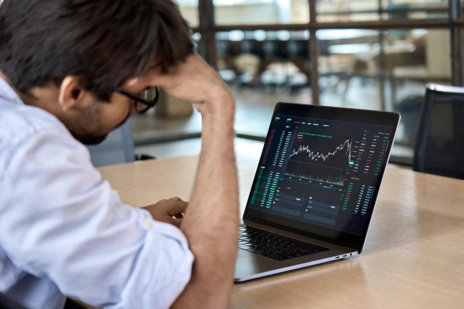 UAE business owner reviewing financial dashboard on a laptop